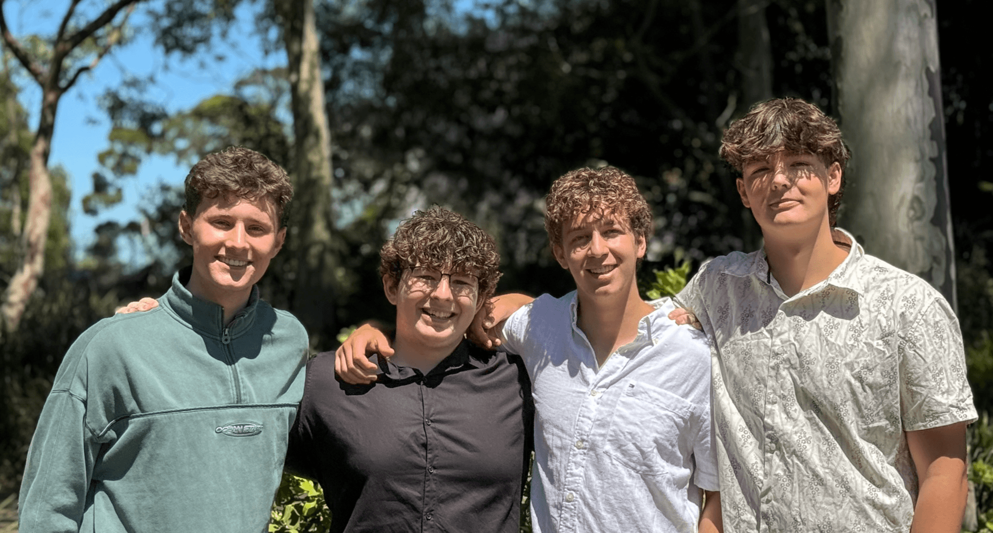 Our team of tutors smiling on the Northern Beaches of Sydney